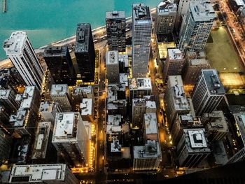 High angle view of city lit up