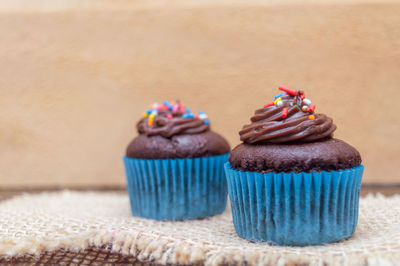 Close-up of cupcakes on table