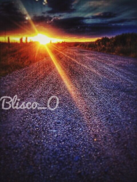 sunset, road, sky, lens flare, transportation, sunbeam, nature, sunlight, sun, no people, street, cloud - sky, sign, asphalt, city, number, outdoors, communication, text, orange color, bright