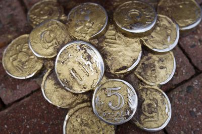 High angle view of coins