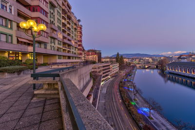 Park and old buildings by sunset, geneva, switzerland - hdr