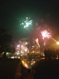 Firework display at night