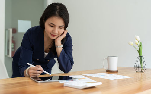 Businesswoman working at office