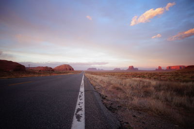 Empty road along monument valley