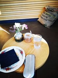 High angle view of wine in glass on table