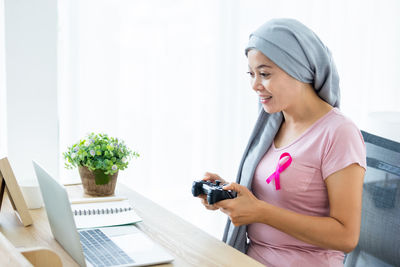 Young woman using mobile phone