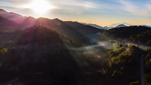 Scenic view of mountains against sky during sunset