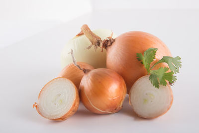 Close-up of eggs against white background