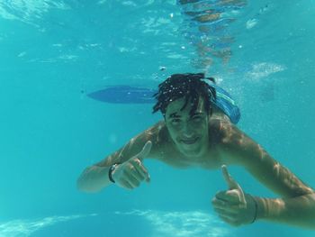 Woman swimming in pool