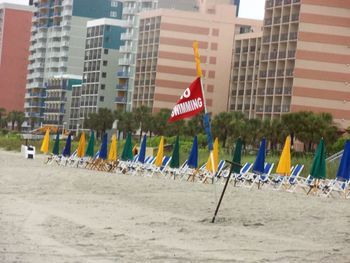 Flags on beach in city