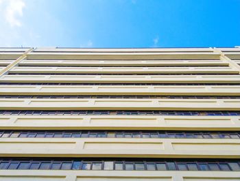 Low angle view of office building against sky