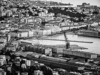 High angle view of crowd and buildings in city