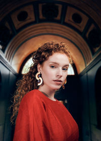 Portrait of young woman looking away