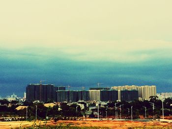 City skyline with sea in background