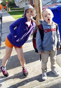 Full length of mother and daughter outdoors