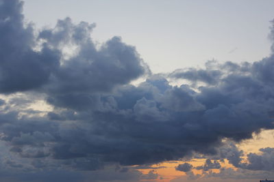 Low angle view of clouds in sky during sunset