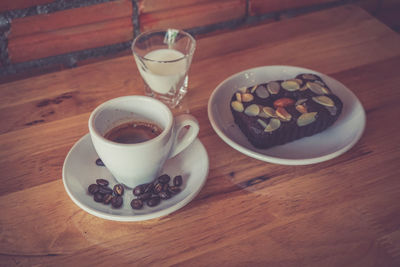 High angle view of coffee cup on table