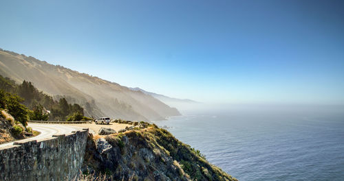 Scenic view of sea against clear blue sky