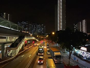 Traffic on road in city at night