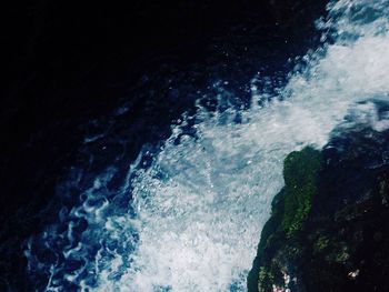 Waves splashing on rocks