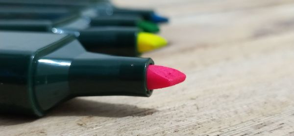 Close-up of colored pencils on table