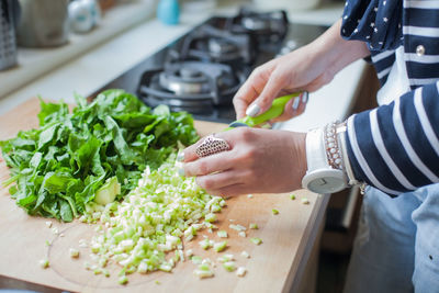 Close-up of woman preparing food