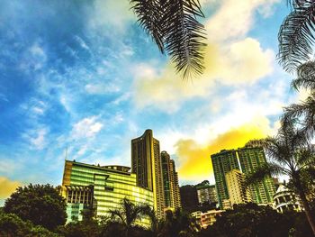 Low angle view of building against cloudy sky