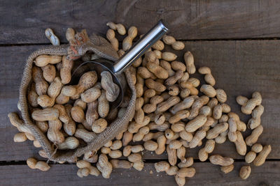 Close-up of roasted coffee beans on table