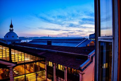 View of buildings against sky at dusk