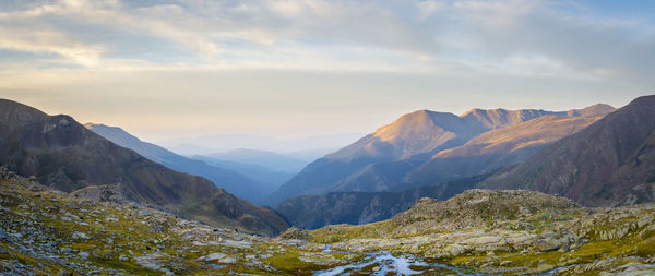 Scenic view of mountains against sky during sunset