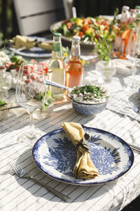 High angle view of napkin in plate on dining table