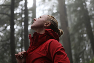 Young woman in forest