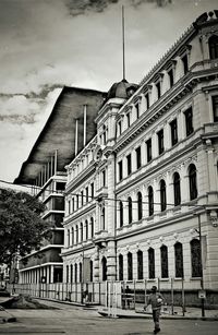 Buildings in city against sky