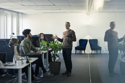 Group of business people having meeting in office