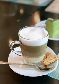 Close-up of coffee cup on table