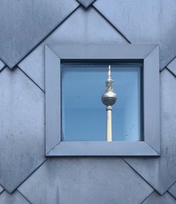 Window reflection of television tower in berlin