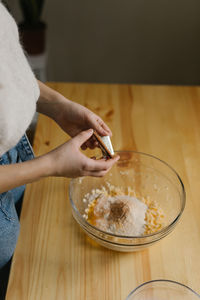 Young woman making christmas cookies