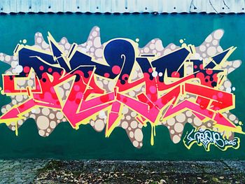 Multi colored text on wall