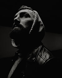 Portrait of young man looking away