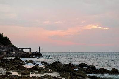 Scenic view of sea against sky during sunset