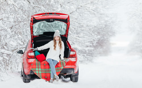 Woman sitting in car