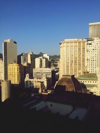 View of skyscrapers against blue sky