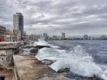 View of city against cloudy sky