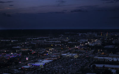 Aerial view of illuminated cityscape at night