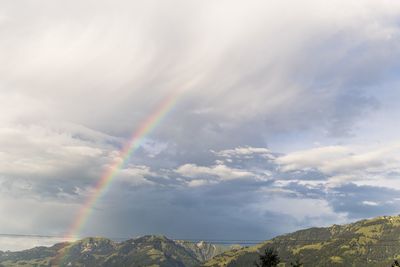 Low angle view of rainbow against sky