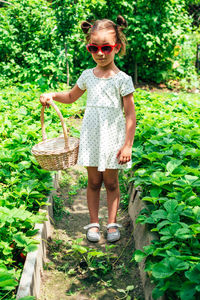 Full length of girl wearing sunglasses