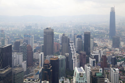 Kuala lumpur, malaysia - september 12 2018 - aerial view of the exchange 106 dwarfing the city.
