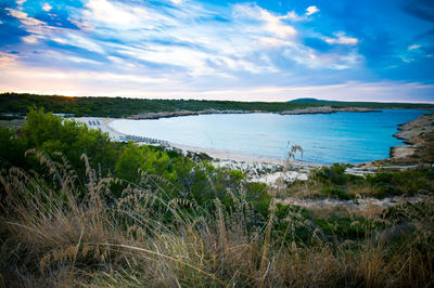 Scenic view of sea against cloudy sky