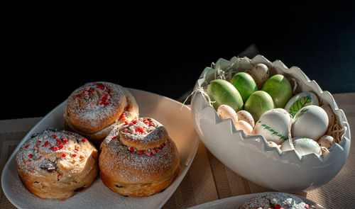 Close-up of fruits in plate on table