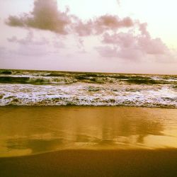 Scenic view of beach against sky